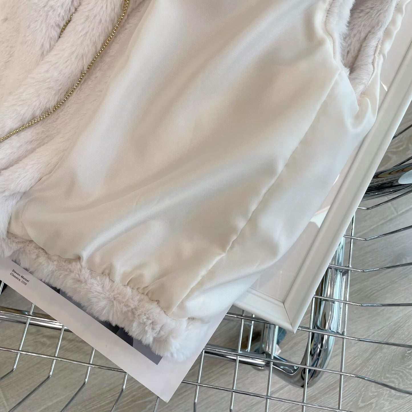 Women's artificial fur effect high neck hooded sleeveless vest