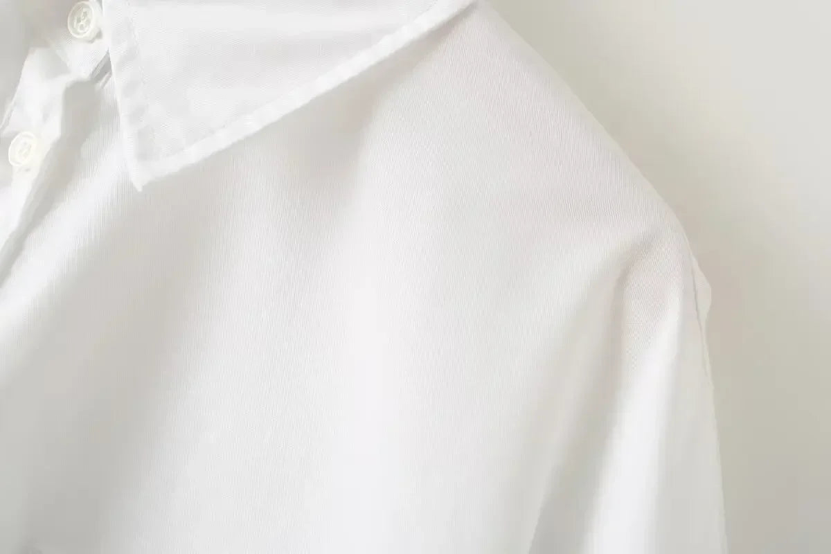 Women's 2024 new fashion hem Split design loose single breasted cotton shirt retro long sleeved pocket women's shirt chic top