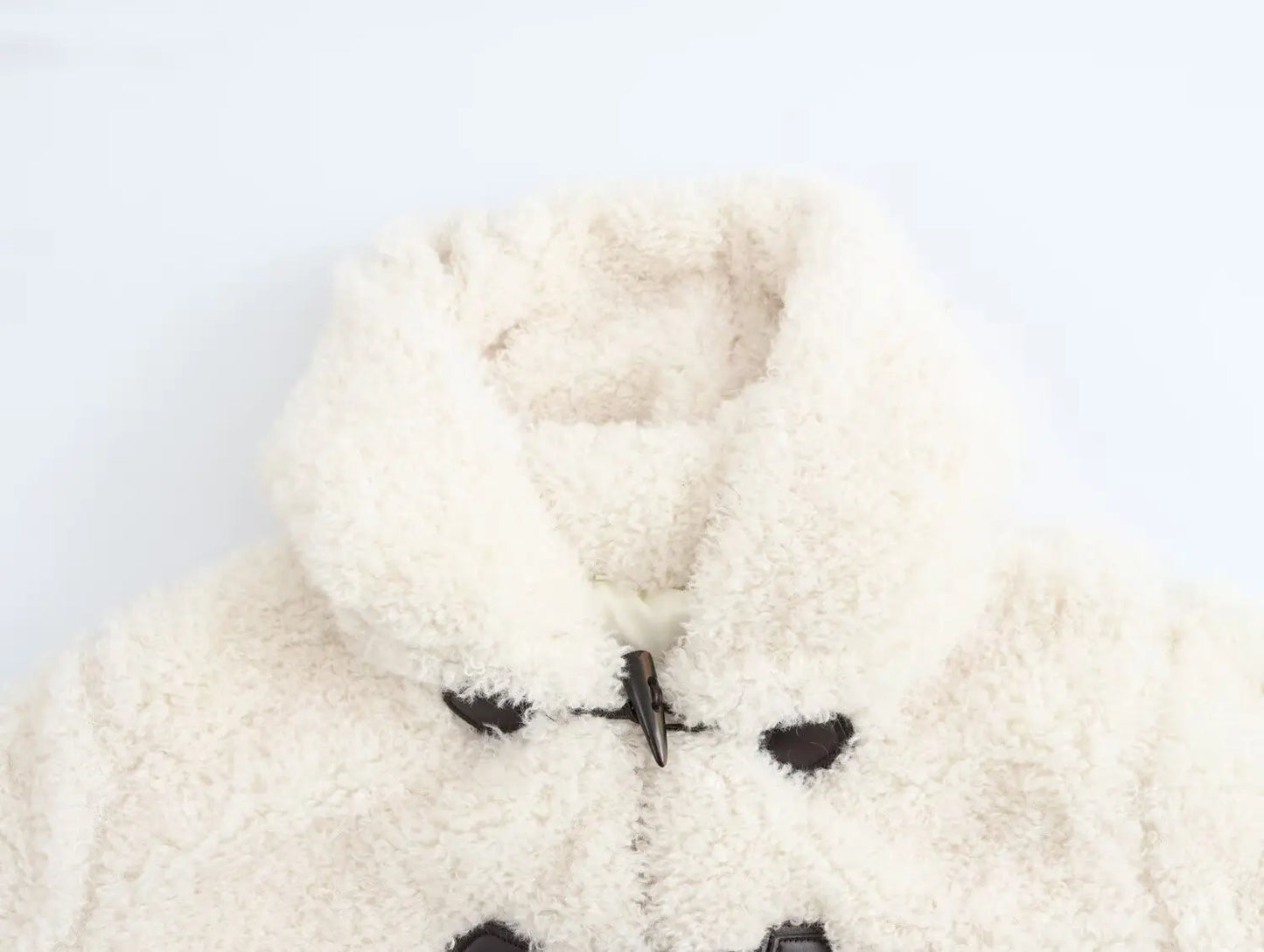 Women's winter fashion Knot button decoration short artificial fur effect hooded coat retro long sleeved women's coat chic top