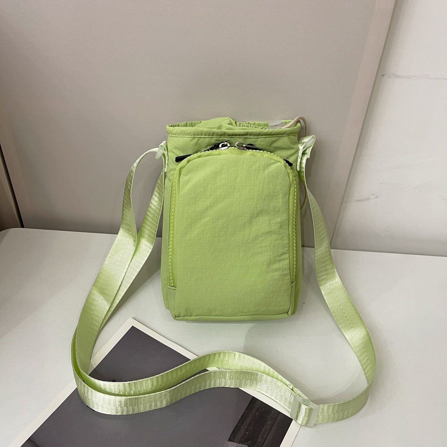 Men's and Women's Leisure Versatile Sports Adjustable Shoulder Strap Multifunctional Water Cup Mobile Phone Messenger Bag