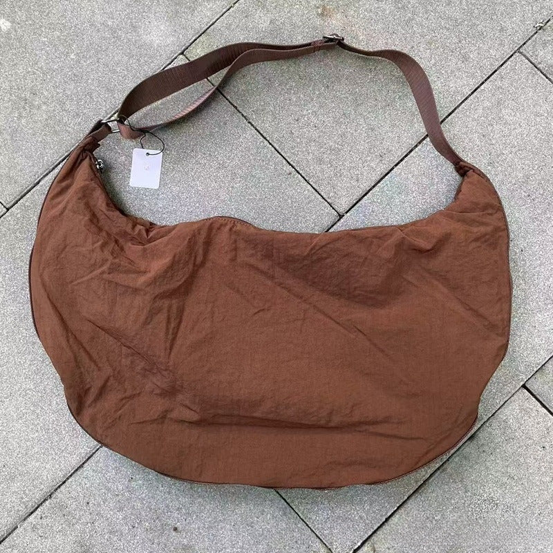 Men's and Women's Large-capacity Waterproof Nylon Lightweight Casual Joker Shoulder Slung Crescent Bag.