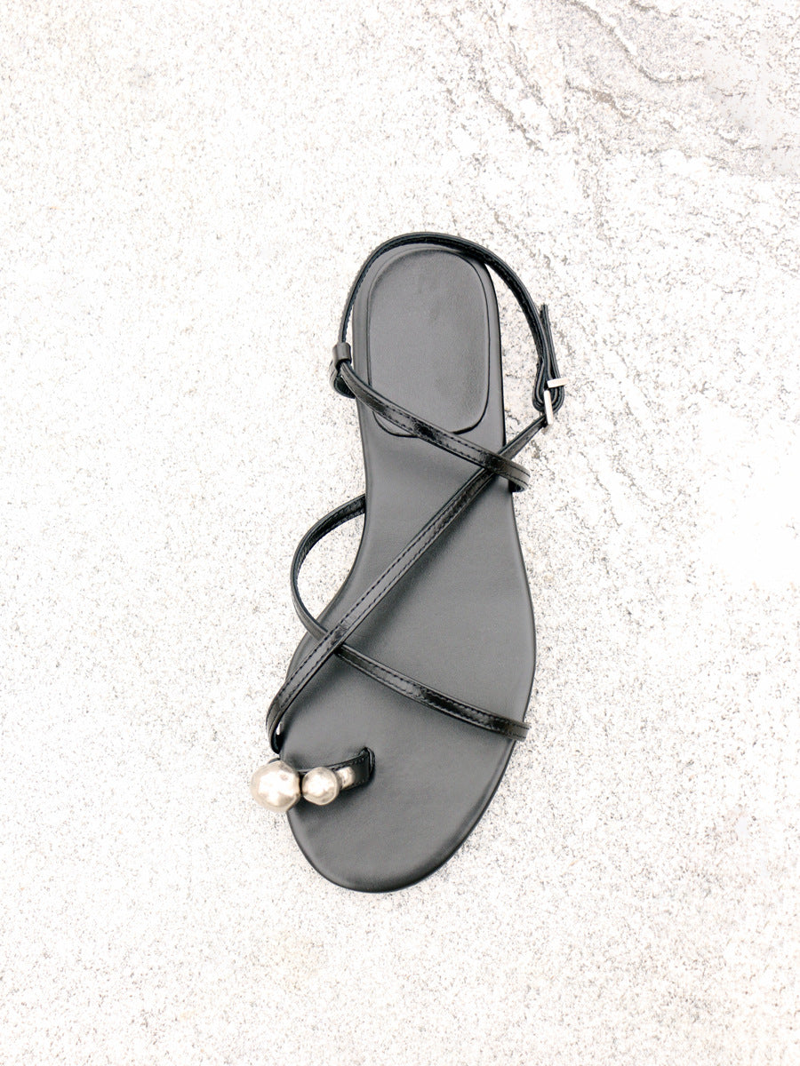 Women's 2025 Summer New Open-toed Flat-bottomed Flip-flops with Crossed Straps.