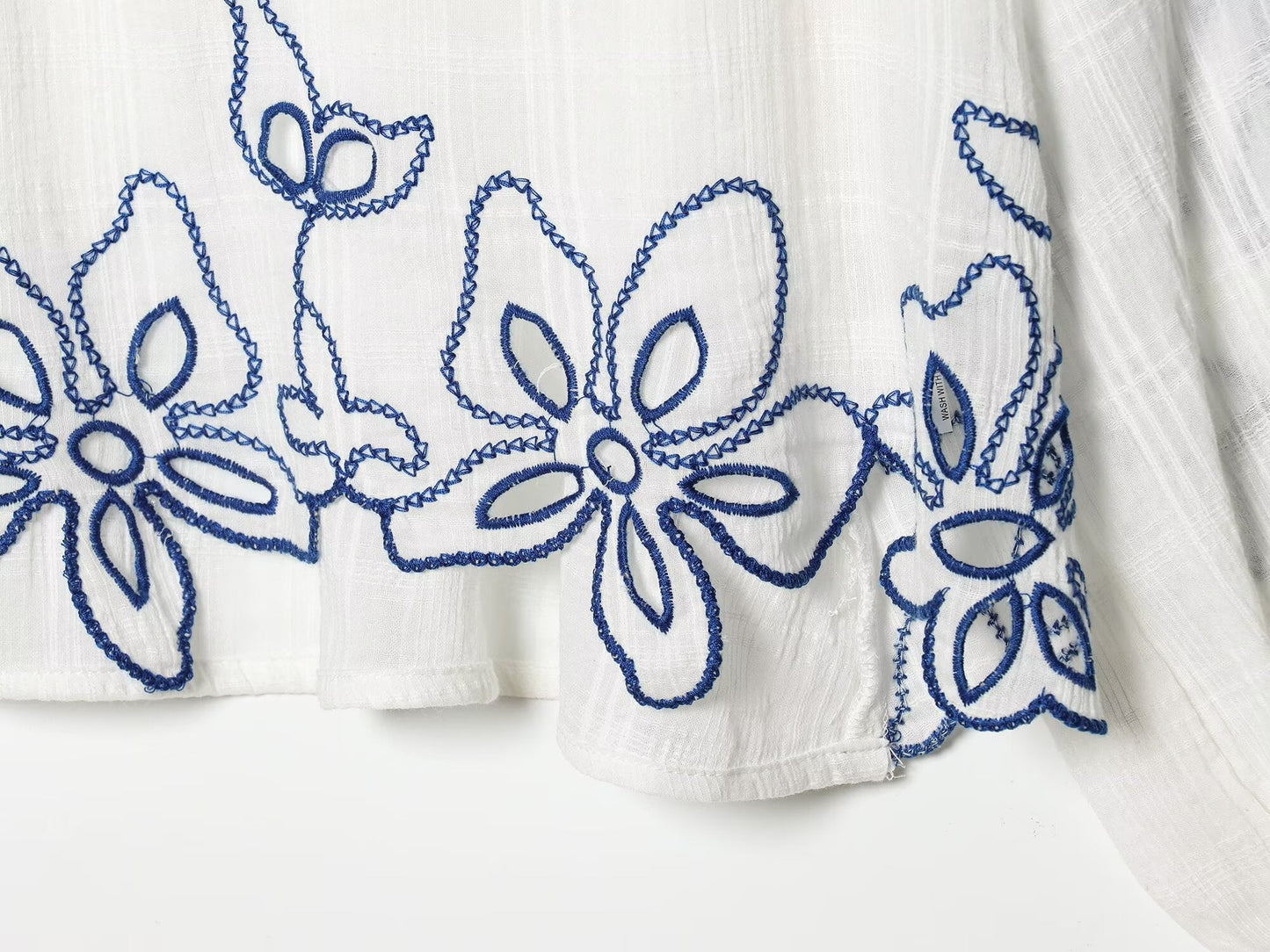 Women's floral embroidered lace up shirt
