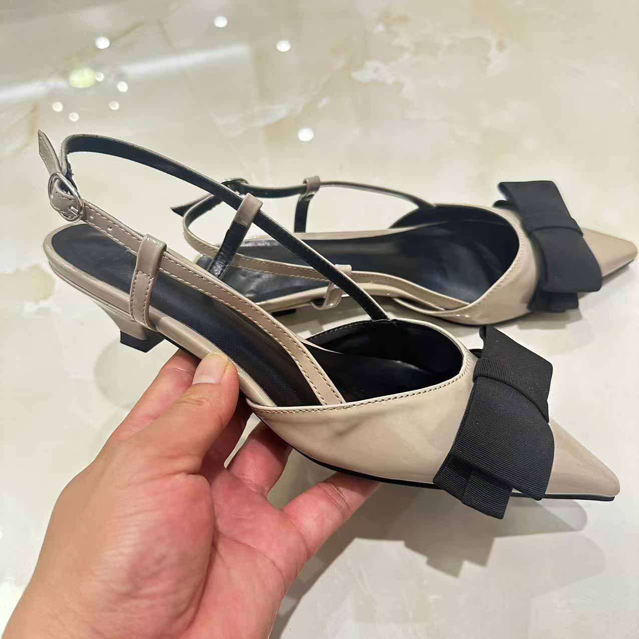 Women's New Fashion Joker Color Matching Patent Leather Bow Decorated with Pointed Sandals.