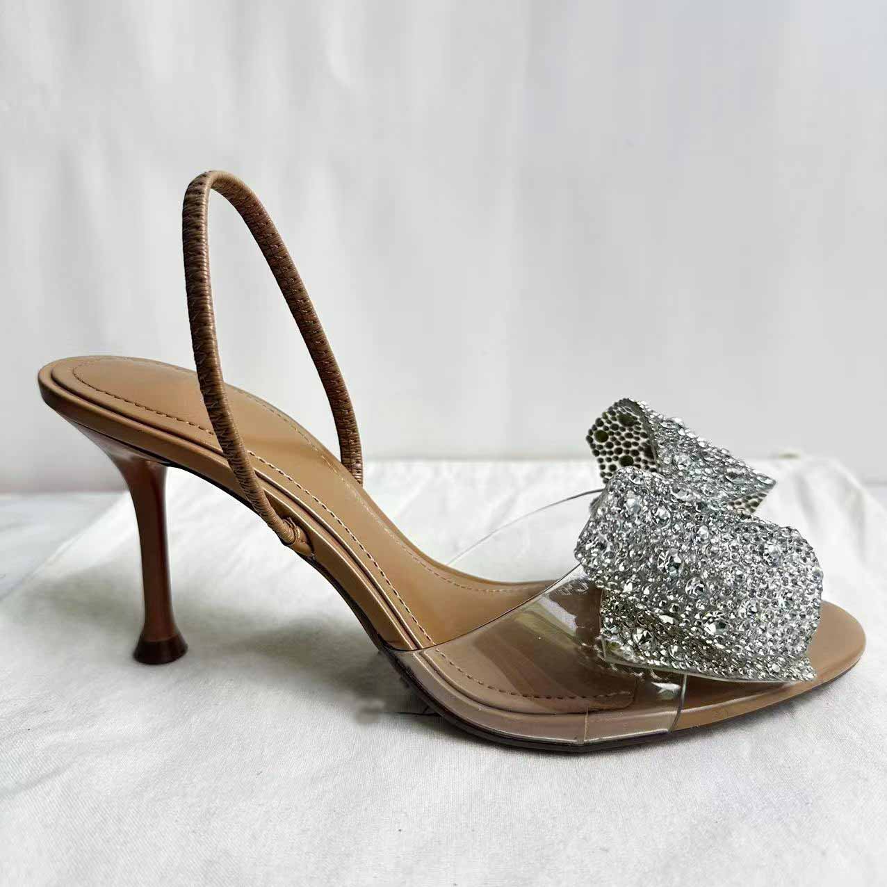 Women's New Fashion Rhinestone Bow Decorated with Transparent Plastic High-heeled Sandals and Open-toed Sandals.