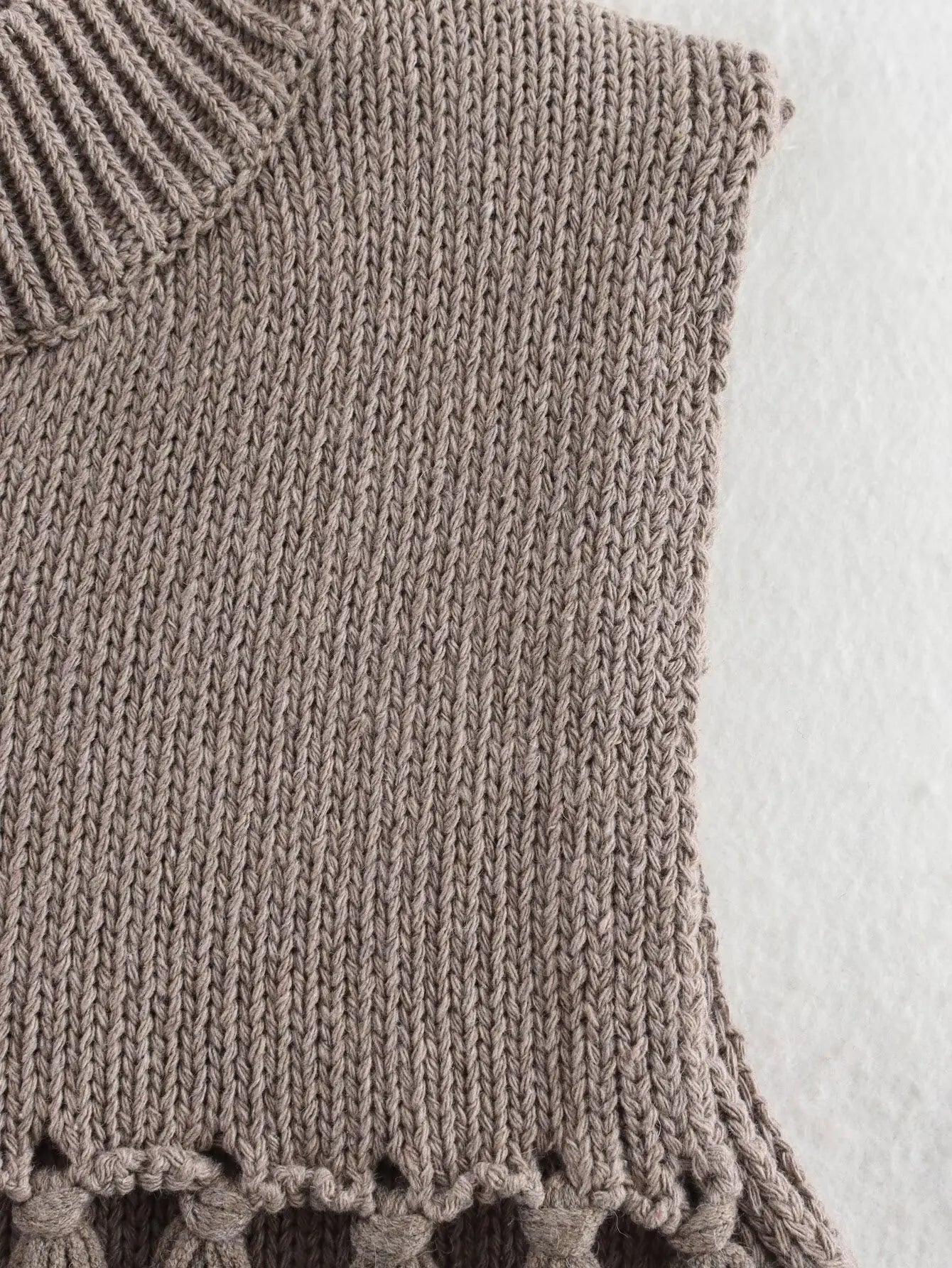 Women's new fashion tassel decoration casual asymmetrical vest style knitted top retro half high neck women's vest chic top