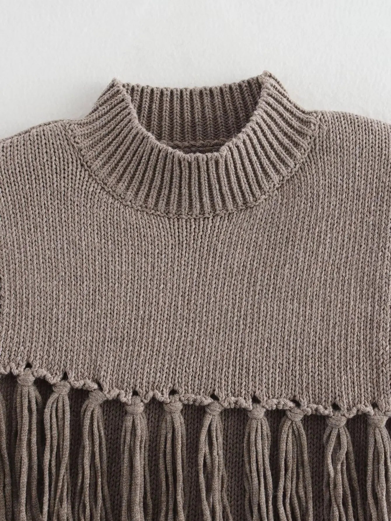 Women's new fashion tassel decoration casual asymmetrical vest style knitted top retro half high neck women's vest chic top