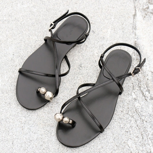 Women's 2025 Summer New Open-toed Flat-bottomed Flip-flops with Crossed Straps.